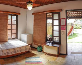 Pousada Ikabana - פירנופוליס - חדר שינה