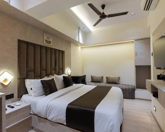 Hotel Larmont Luxury - Mumbai - Phòng ngủ