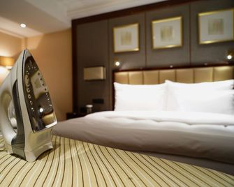 Country Inn & Suites by Radisson Bathinda - Bathinda - Bedroom