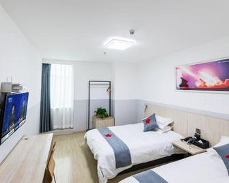Chaohu Junjie Hotel (Renmin Road) - Хефей - Спальня
