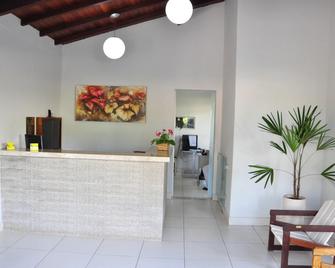 Refúgio Escarpas do Lago - קאפיטוליו - דלפק קבלה