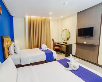 Parkside Star Hotel Jayapura - Jayapura - Schlafzimmer