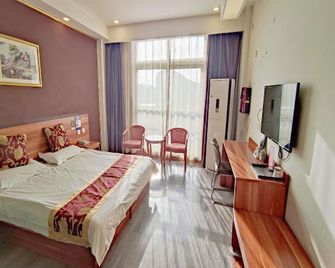 Shankee Express Hotel (Linyi International Convention and Exhibition Center) - Linyi - Bedroom