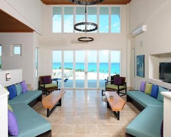 Sky Beach Club Villa Waterfall 1 4 Bedroom Villa - Governor’s Harbour - Living room