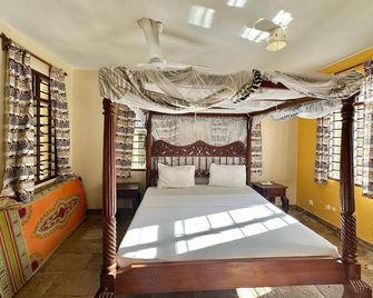 Vacation villa in Kenya in a fantastic location incl.Wlan +Smart TV Pay- TV - Diani Beach - Chambre