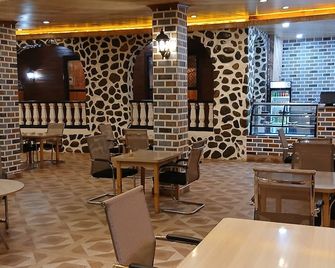 Mcroyal Hotel - 哈根山 - 餐廳