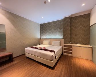 Grand Singgie Hotel - Tanjung Balai - Habitación