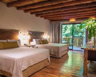 La Aldea De La Selva Lodge - פוארטו איגואזו - חדר שינה