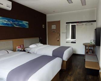 Thank Inn Hotel Sichuan Suining Suizhou Nan Road - Suining - Schlafzimmer