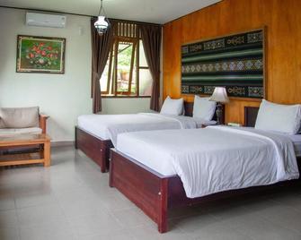 Amartya Puri Green Cottages - Banjar - Schlafzimmer