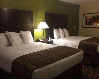 Boarders Inn & Suites by Cobblestone Hotels - Ashland City - Ashland City - Bedroom