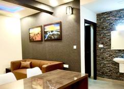 Green Royale Living Spaces - Luxury Serviced Apartments - Thiruvananthapuram - Sala de estar