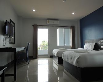 Trang Grand Hotel - Trang - Schlafzimmer