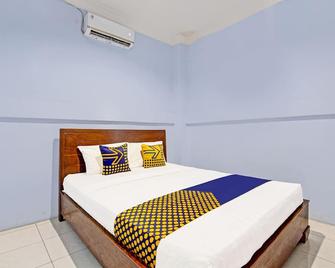 Spot On 91356 Hotel Mustika 2 Syariah - Rembang - Habitación