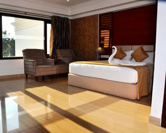 Hotel Lake Palace - Thiruvananthapuram - Soverom