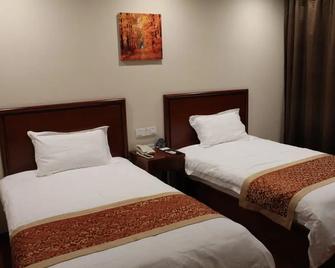 Gme Nanjing Caochangmen Nanyihou Stress Hotel - Nanjing - Bedroom