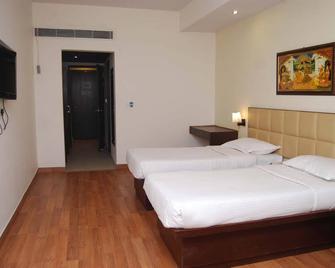 Hotel Golden Orchid - Lucknow - Bedroom