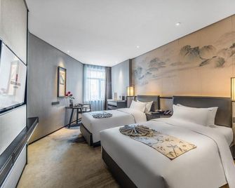 Licheng donggu Hotel(Harbin Ice and Snow World) - Harbin - Slaapkamer