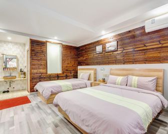 Yinju Guesthouse - Jiujiang - Bedroom