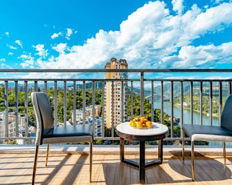 Xishuangbanna Yunheyuan Hotel - Xishuangbanna - Balkon