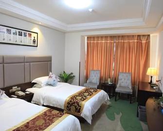 Gujing Junlai Hotel - Huainan - Slaapkamer