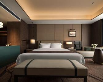 Wugang Hotel (Wugang North Bus Station Wugang Airport) - Shaoyang - Bedroom
