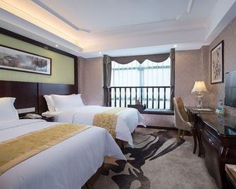 Vienna Hotel (Meizhou West High-Speed Railway Station Branch, Guangdong) - Meizhou - Bedroom