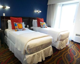 Nesva Hotel - Queens - Quarto