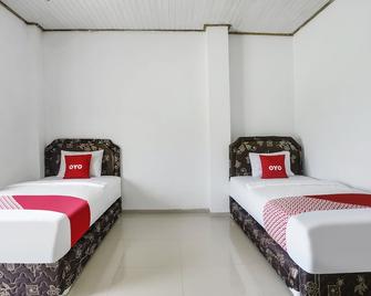 OYO 2246 Anjung Bang Oking Hotel & Resort - Krui - Habitación