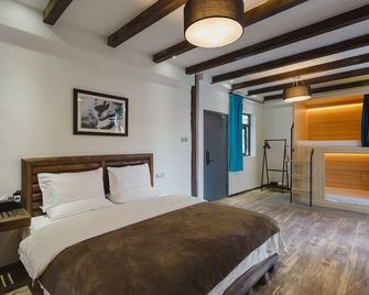 Lijiang Desti Youth Park Hostel - Lijiang - Bedroom