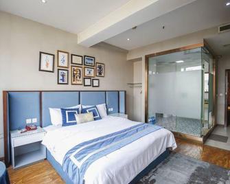 Yuhuayuan Hotel - Meishan - Bedroom
