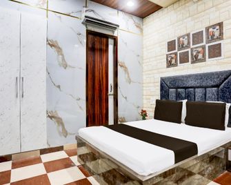 Hotel O Zr - Bathinda - Bedroom