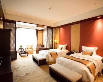 Ovation Seven-Cultivation Hotel - Langfang - Bedroom