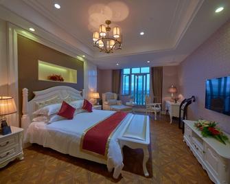New Century Manju Select Hotel Hongqiao Hub National Exhibition Center - Shanghai - Bedroom