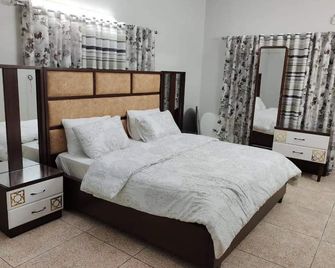 Hotel Golden Inn - Karachi - Habitación