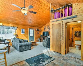 Cozy Manistique Cabin with Deck, Grill and Fire Pit! - Manistique - Living room