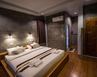 Phumektawan Resort - Chiang Rai - Makuuhuone