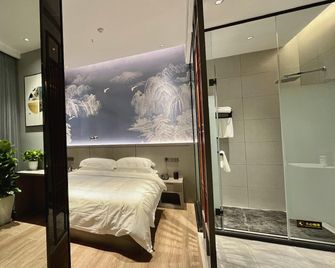 Nanchong Silver-haired Smart Hotel (Xihua Normal University Huafeng Campus Branch) - Nanchong - Schlafzimmer