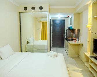 Modern Studio Grand Serpong Apartment By Travelio - Tangerang - Habitación