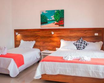 Hostal Loja - Puerto Villamil - Bedroom