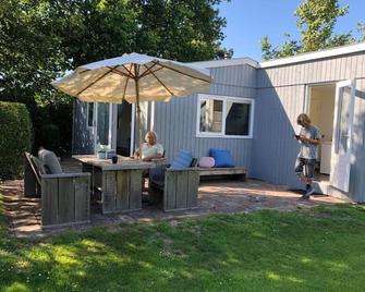 Have a nice stay! - Vakantiehuis de Schelp op rustig park - Noordwijk - Patio