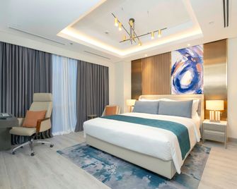 Savoy Hotel Mactan Newtown - Lapu-Lapu City - Slaapkamer