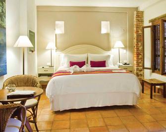 فندق باندوتا من فاراندا بوتيك، وهو عضو في مجموعة راديسون إندفيدوالز - كارتاخينا دي إندياس - غرفة نوم