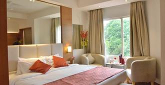 Hotel Landmark - Gwalior - Camera da letto