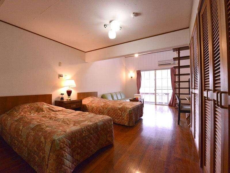 Petit Hotel Key West Club - אונה - חדר שינה
