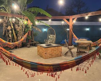 Vila Say House with 4 bedrooms, air conditioning and heated pool - Sao Francisco do Sul - Patio