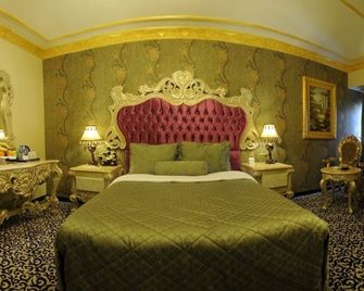 Kaya Premium Hotel - אדנה - חדר שינה