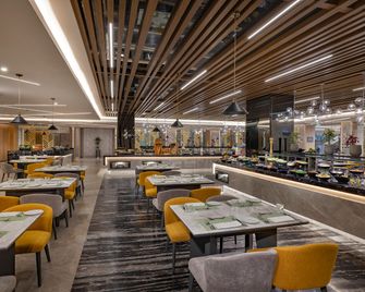 Holiday Inn & Suites Al Khobar By IHG - Al Khobar - Restaurant