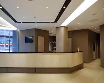 Home Inn Style Mudanjiang High-Speed Railway Station Dashang New Mart Jiangbin Park - Mudanjiang - Front desk