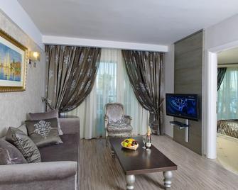 Elinotel Apolamare Hotel - Chaniotis - Wohnzimmer